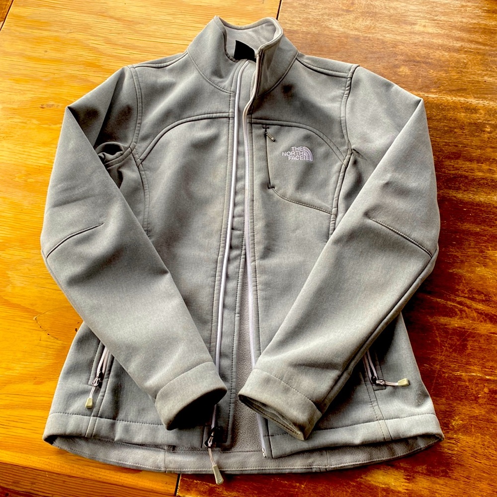 The North Face Windwall fleece lined jacket. Women’s extra small, grey.